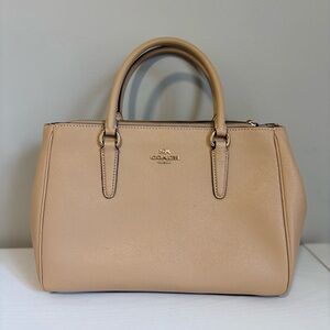 Coach Surrey Carryall satchel handbag in a light beige or nude tone